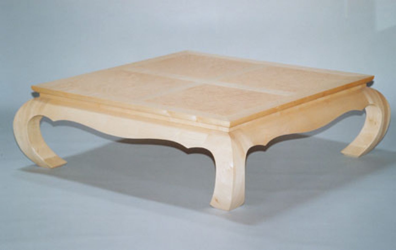 Oriental Coffee Table in Sycamore with Birds-Eye Maple Panelled Top