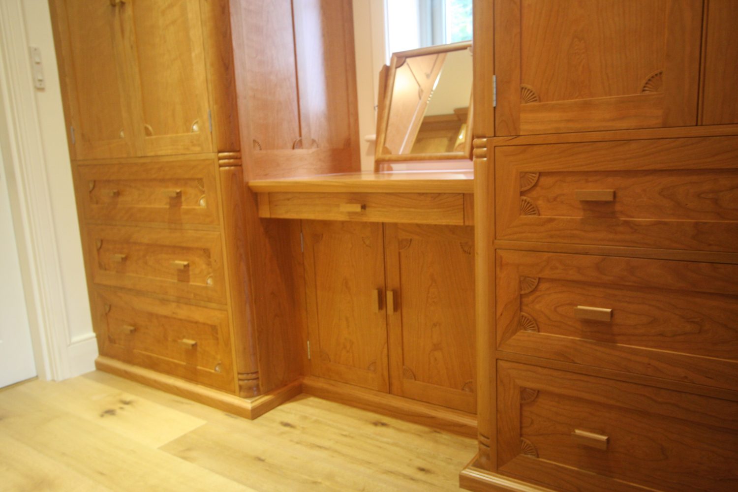 Dressing table with drawer beneath and recessed cupboard
