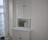 Alcove Cabinet with Enclosed Top Doors Leaving Curtain Pocket