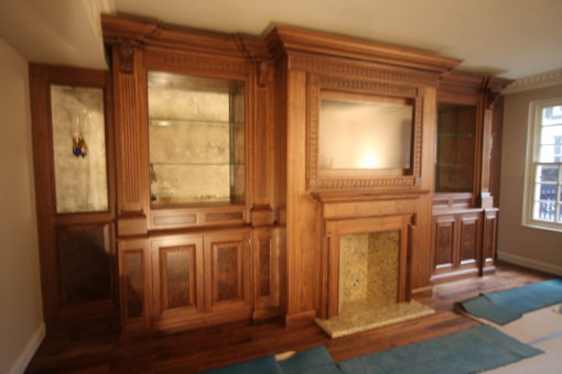 American Walnut Fireplace with Bookcases and Panelling
