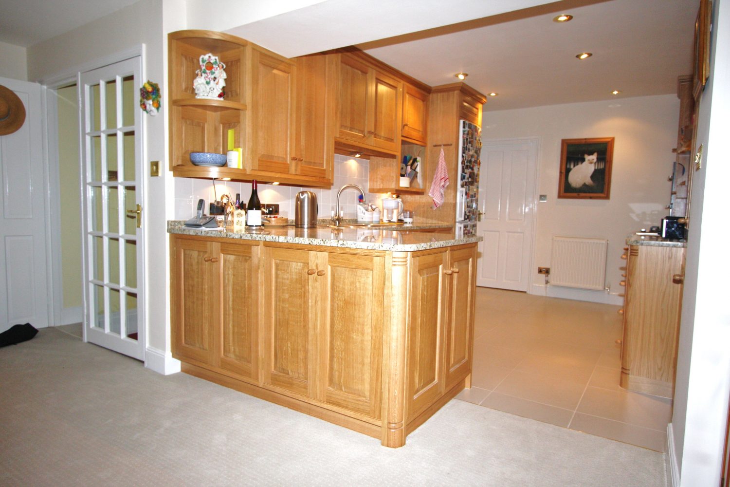 Breakfast bar base with wall units fitted under beam
